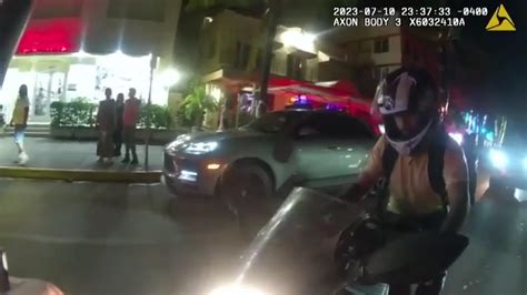 Bodycam footage shows motorcyclist crashing into restaurant in Miami Beach after fleeing from traffic stop